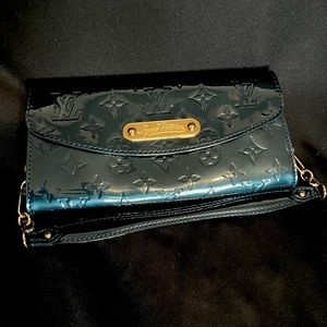 Hunter green Loui Vuitton purse